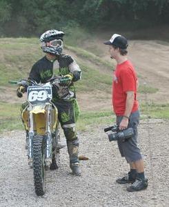 Steve talks over a trick with rider Tucker Fisher.